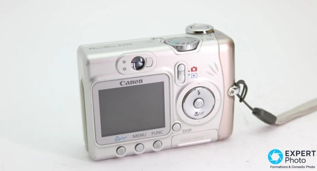 Canon PowerShot A510 face arrière, écran LCD 1,8 pouce, molette de navigation et boutons MENU FUNC. DISP. 