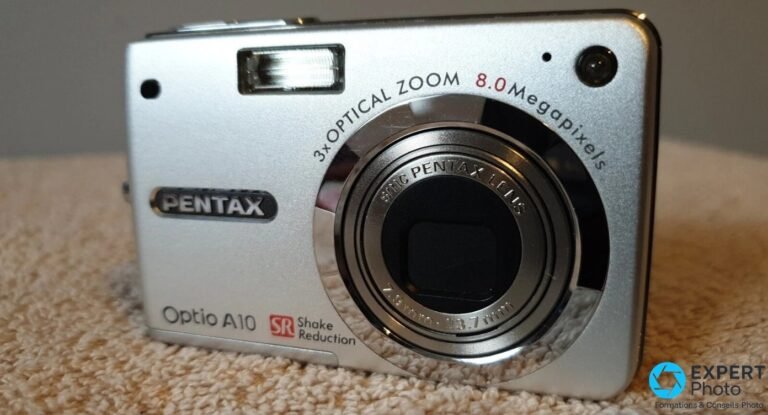 Pentax Optio A10 argenté en 3/4 avant, objectif SMC Pentax sorti, mention 3x Optical Zoom et Shake Reduction.