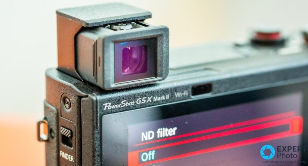 Gros plan du viseur électronique rétractable du G5 X Mark II déployé, marquage PowerShot G5 X Mark II Wi-Fi visible.