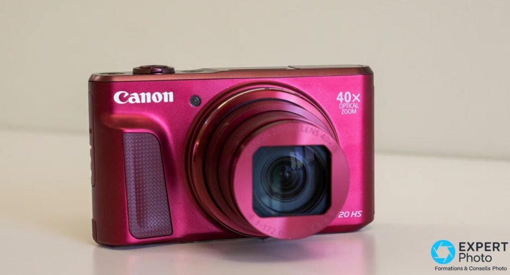 Canon PowerShot SX720 HS coloris rouge framboise vu de face avec mention 40x optical zoom
