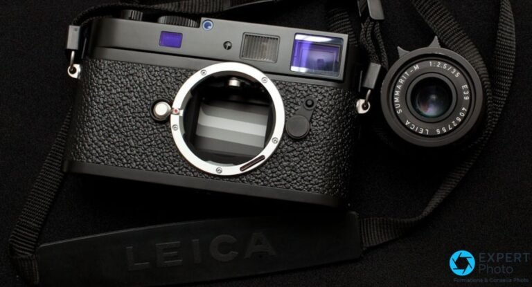 Leica M9-P : avis 2026, rendu CCD et risques avant achat d’occasion Face du Leica M9-P noir a monture M ouverte sur fond noir, pres d'un objectif Leica Summarit-M 1:2.5/35