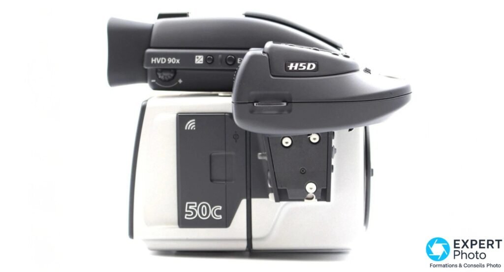 Hasselblad H5D-50c Wi-Fi profil gauche, dos 50c avec icône Wi-Fi visible, viseur HVD 90x, corps argenté et noir