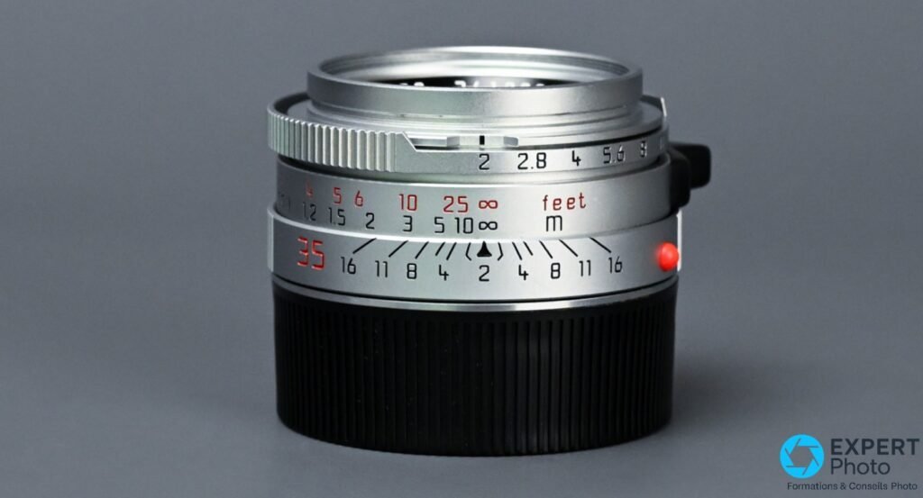 Leica Summicron-M 35mm f/2 IV chrome — détail face avant, bagues de mise au point et de diaphragme avec inscriptions 