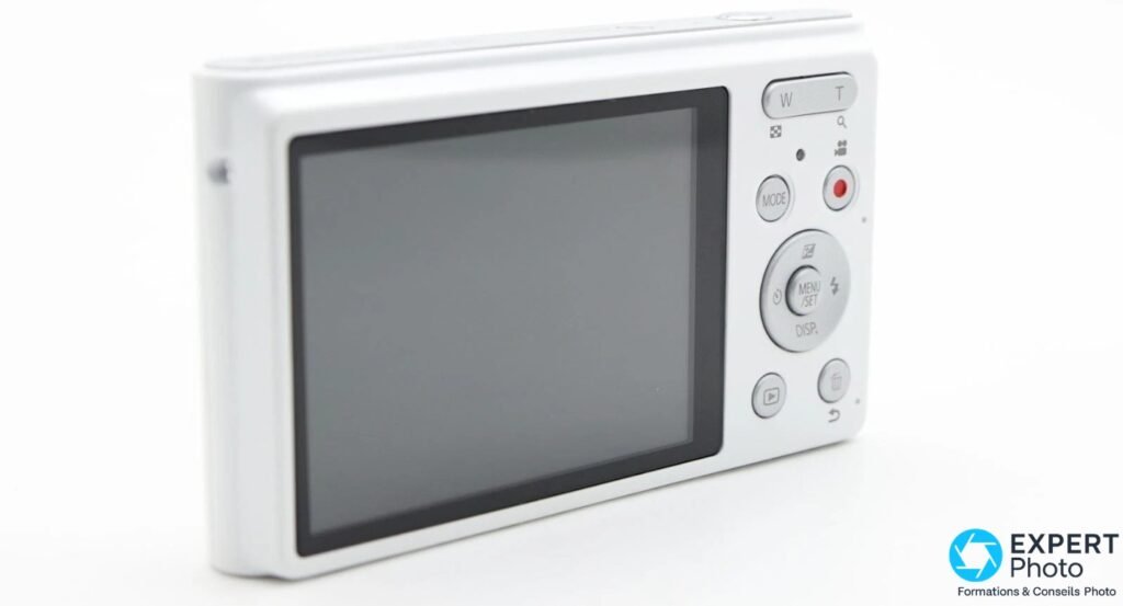 Panasonic Lumix DMC-XS1 face arrière, écran éteint, molette de navigation et boutons W/T, MODE, MENU/SET, DISP. visibles