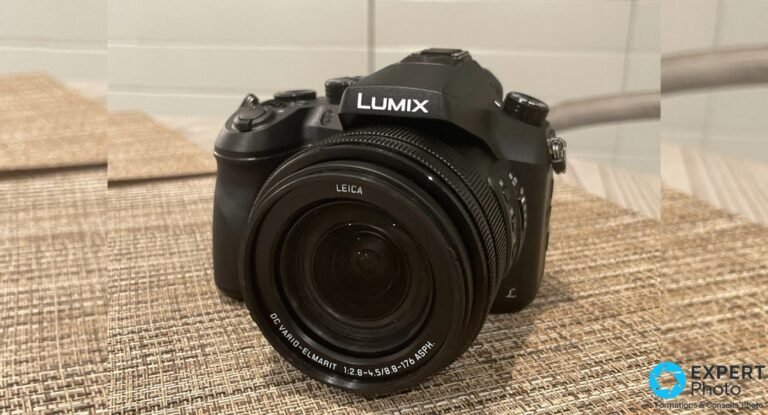 Panasonic Lumix FZ2500 / FZ2000 : un bridge vidéo d’occasion, pas un polyvalent photo Panasonic Lumix FZ2500 de face, objectif LEICA DC Vario-Elmarit 1:2.8-4.5, posé sur surface tressée